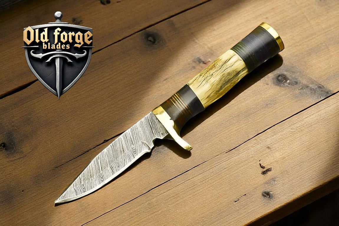 Handmade damascus steel hunting knife with antler horn handle and leather sheath