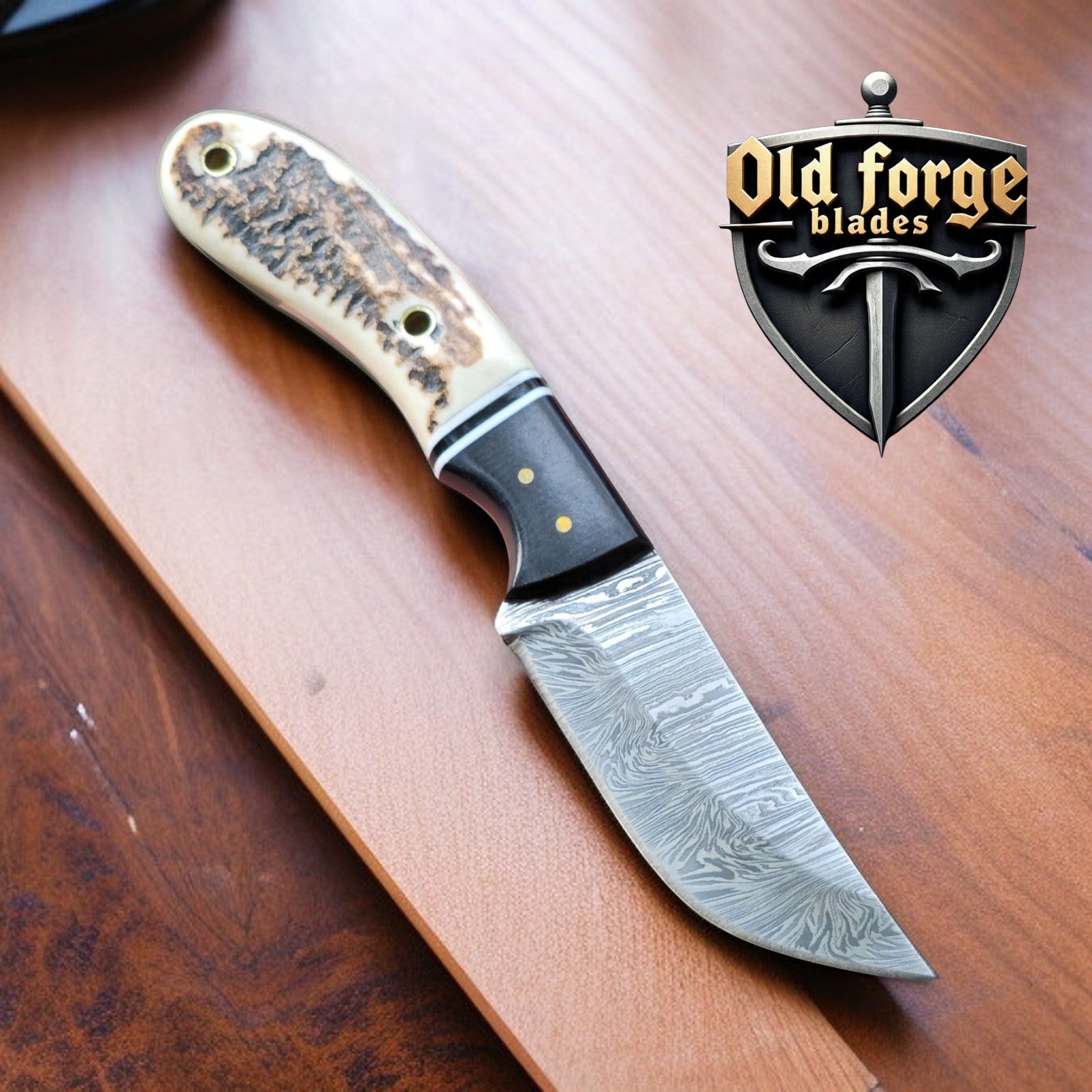 Handmade Damascus hunting knife with stag antler handle and leather sheath