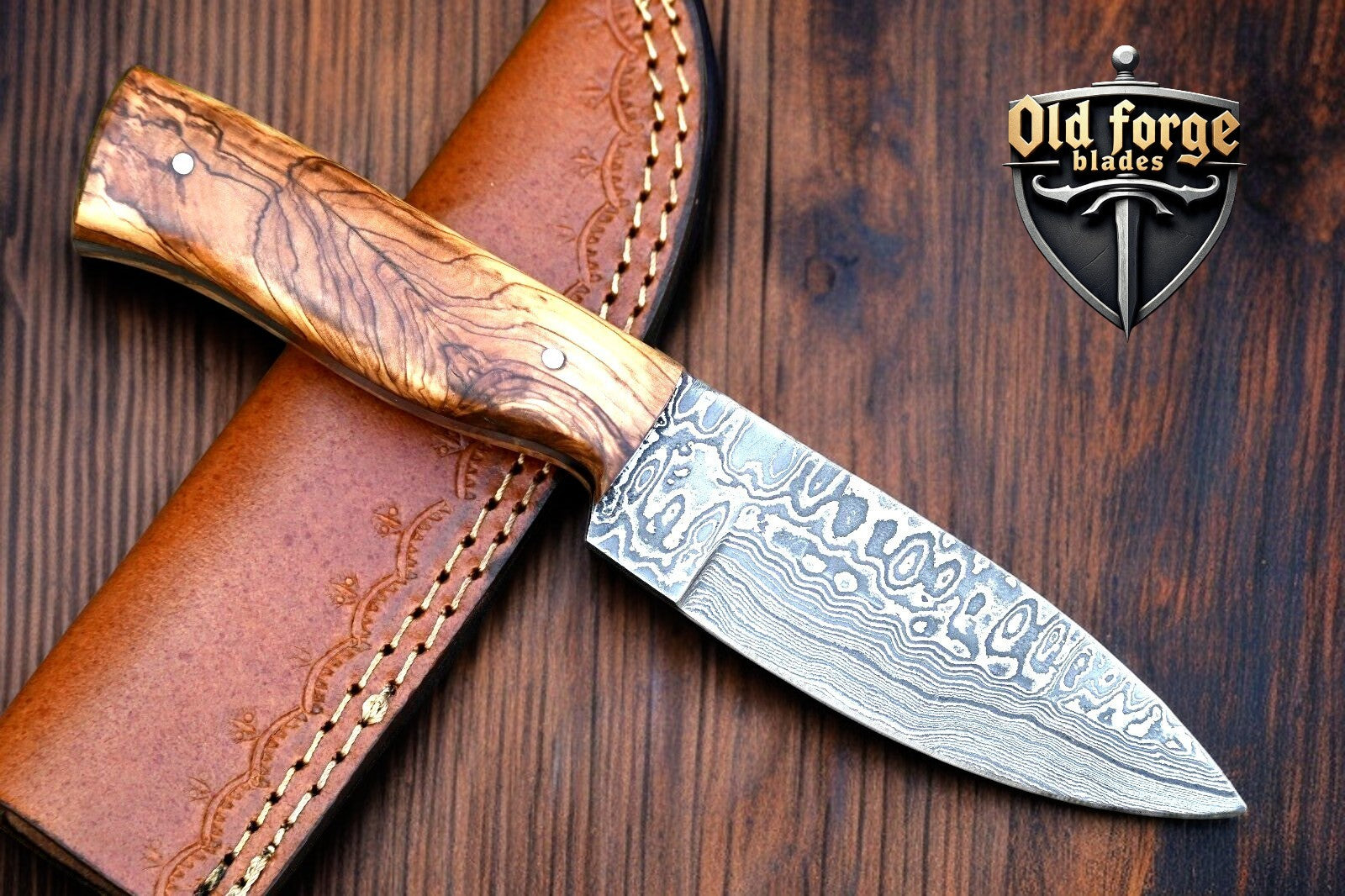 Handmade Damascus custom hunting knife with wood handle and rain drop pattern, including premium leather sheath.