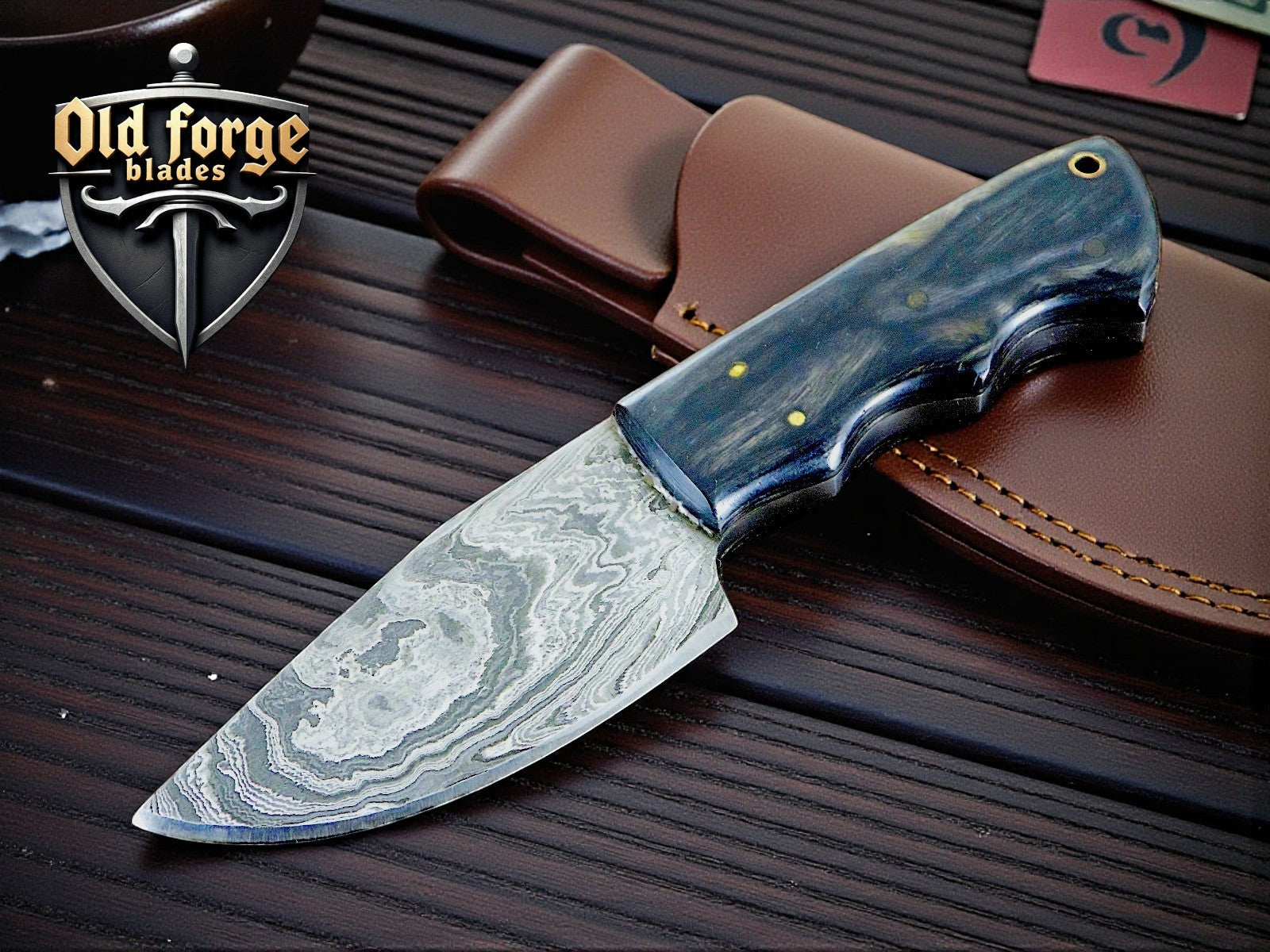 Handmade Damascus steel hunting knife with black rosewood handle and leather sheath