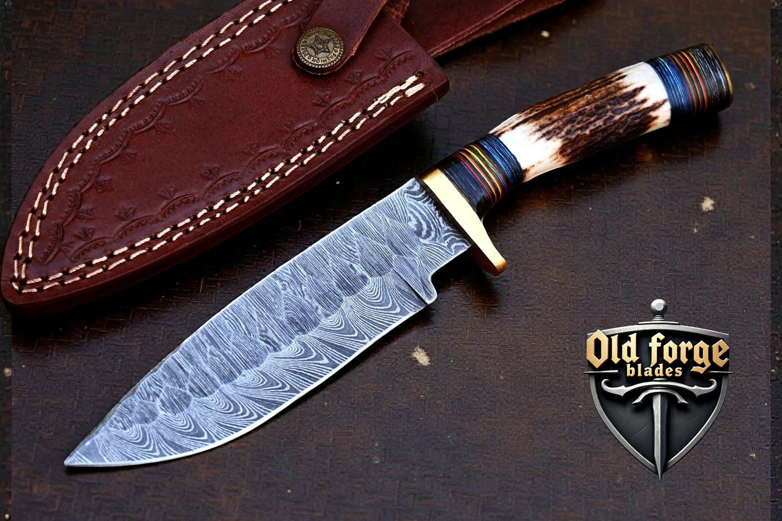 Hand-forged damascus steel fixed blade hunting Bowie knife with stag antler handle and leather sheath