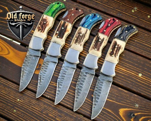 Six color variants of handmade pocket knife with leather sheath