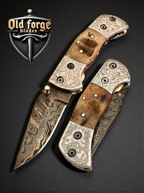 Handmade Damascus pocket knife engraved with sheep horn handle