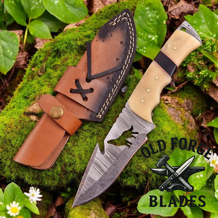 Handmade Damascus knife with wolf bone handle