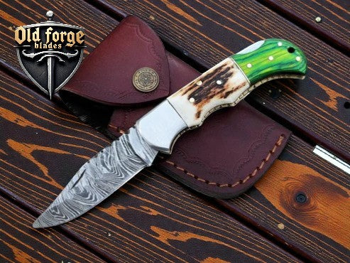 Elite 3-inch Damascus blade pocket knife in black handle variant
