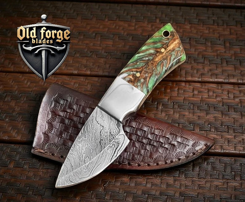 Handmade damascus knive skinning knife with epoxy pine cone handle and leather sheath