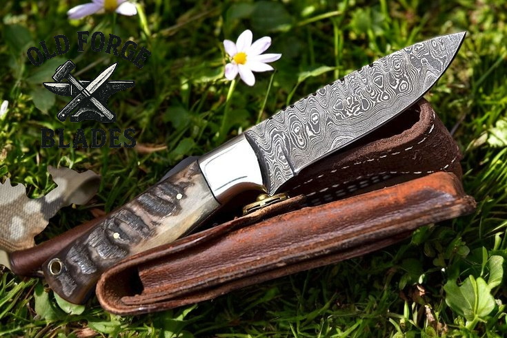 Premium damascus blade knife with goat horn handle and sheath