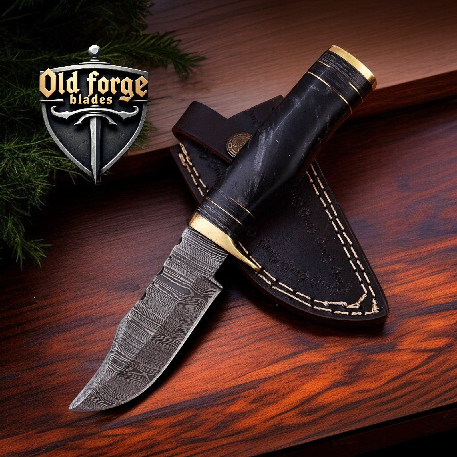 Handmade Damascus hunting knife with black resin handle and leather sheath