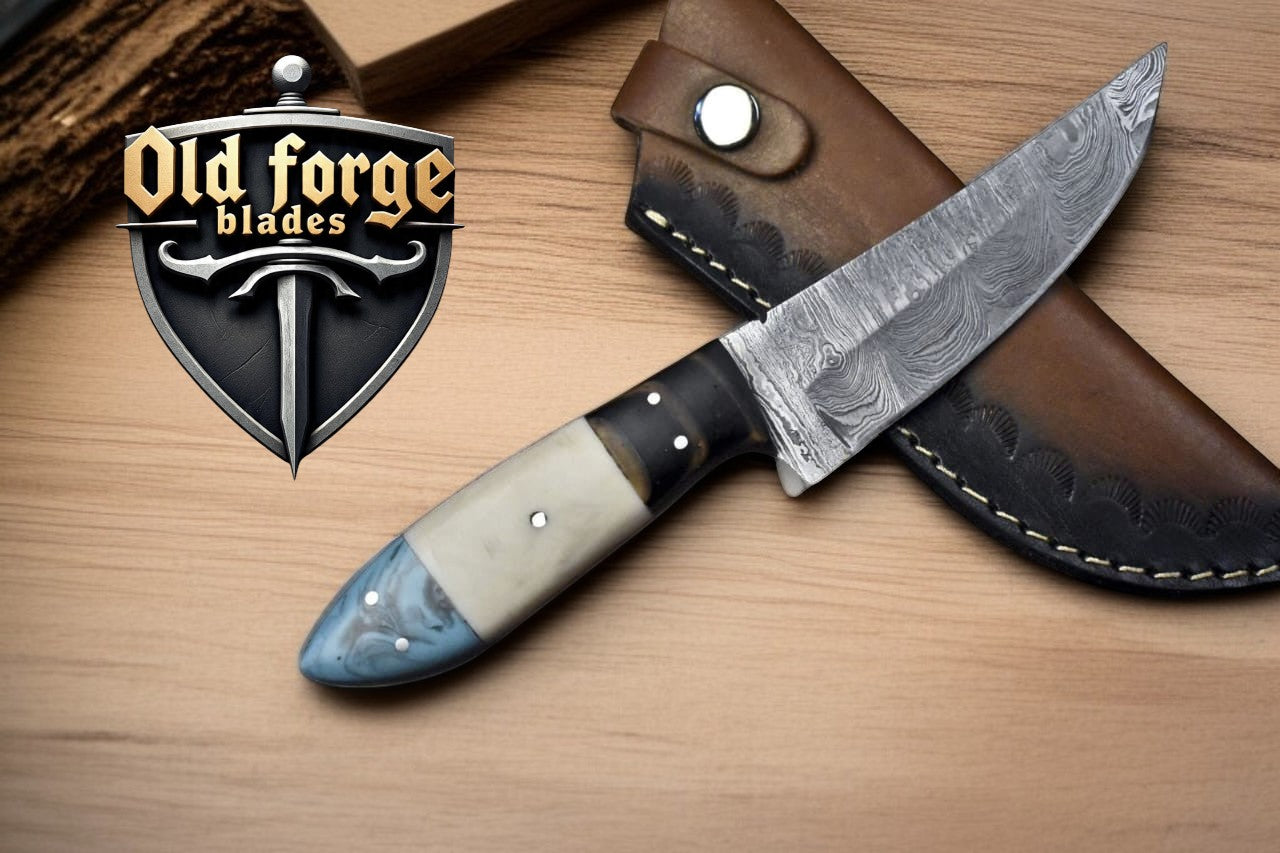 Handmade Damascus steel skinning knife with epoxy resin bone and rosewood handle