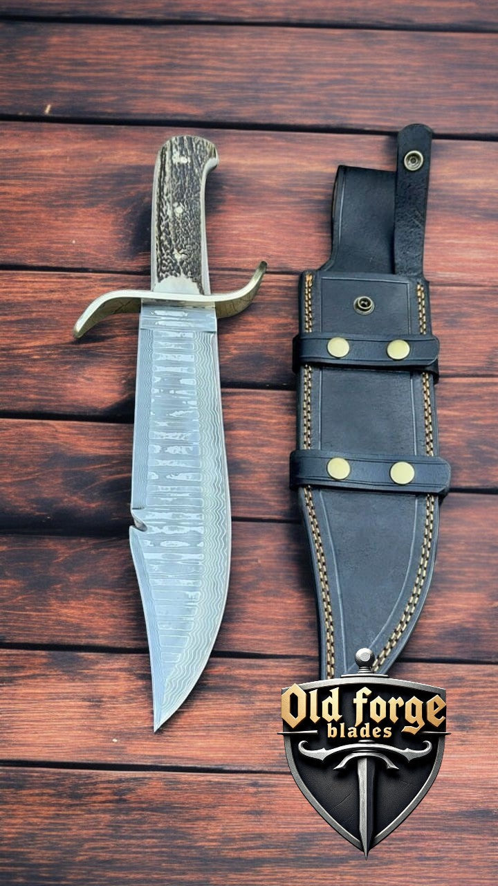 Handmade Damascus steel Bowie knife with stag horn handle and leather sheath