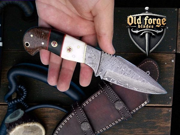 Custom handmade damascus hunting knife with camel bone and buffalo horn handle and leather sheath