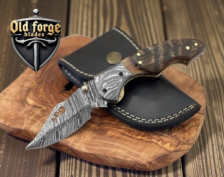 handmade damascus pocket knife with ram horn handle liner lock