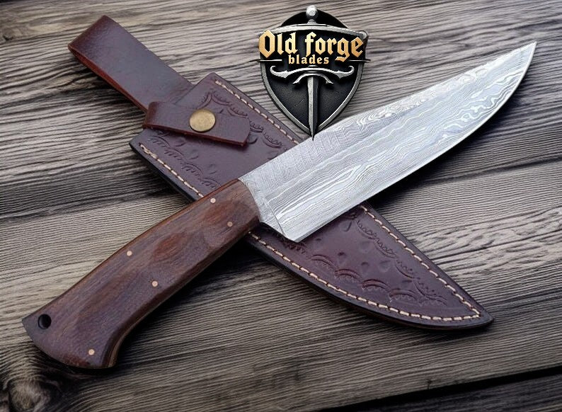 High-quality Damascus hunting knife showing blade pattern