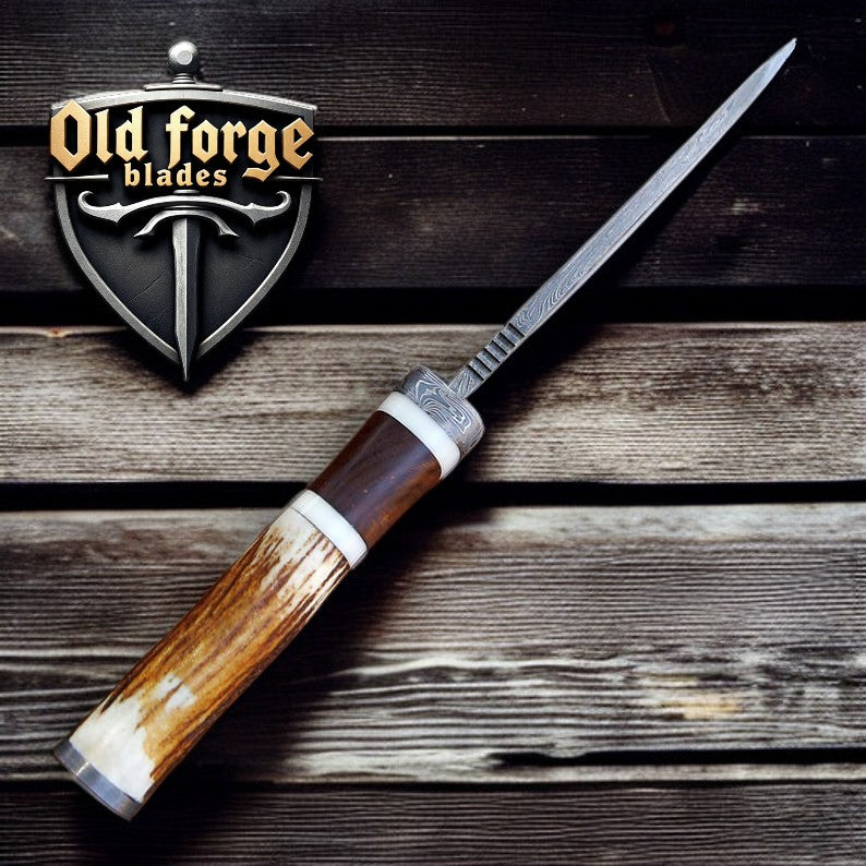 Knife with wooden handle on a wooden background, featuring 'Old Forge Blades' logo.