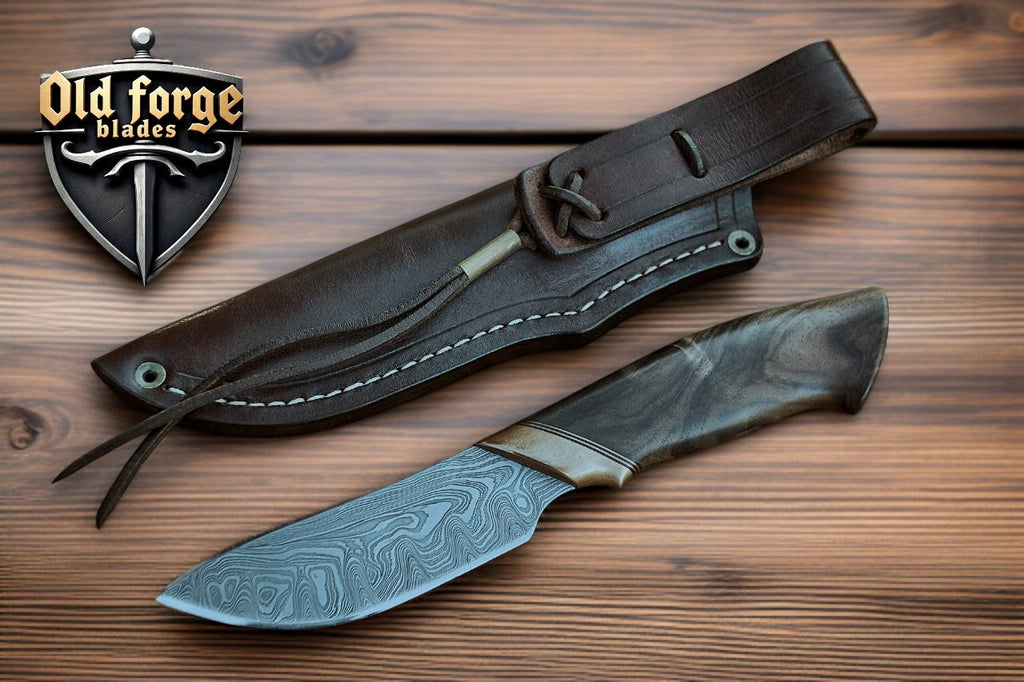 Close-up of Damascus hunting knife blade pattern and sharp edge