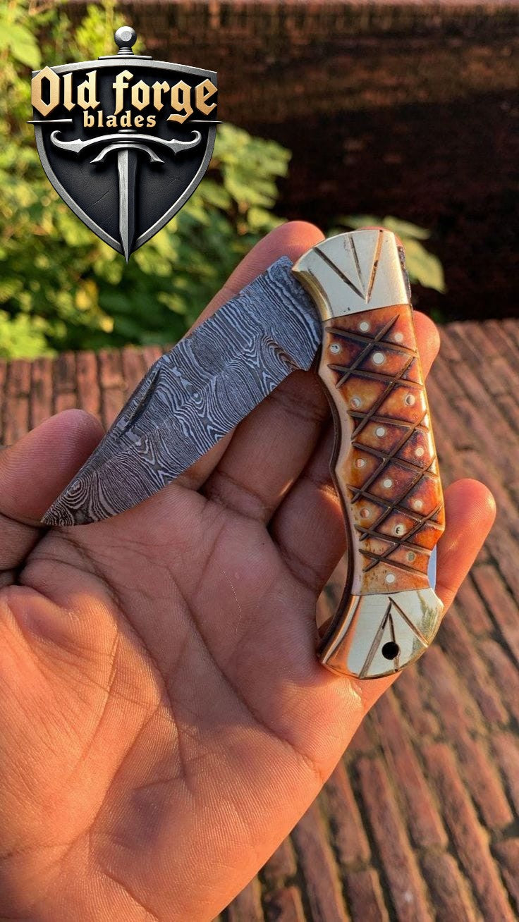 handmade damascus pocket knife with burl camel bone handle