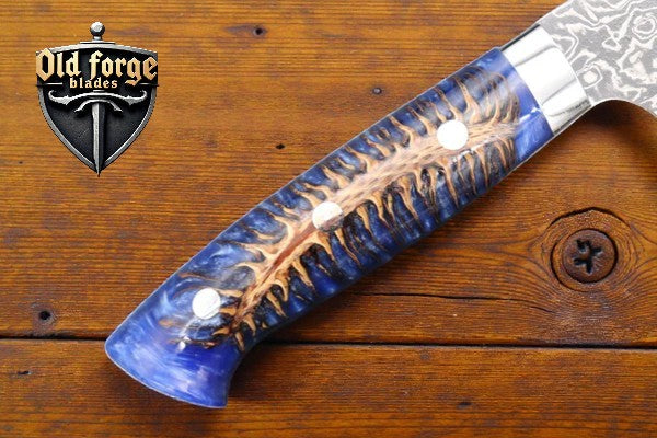 Handmade Damascus cooking knife with stainless steel bolster